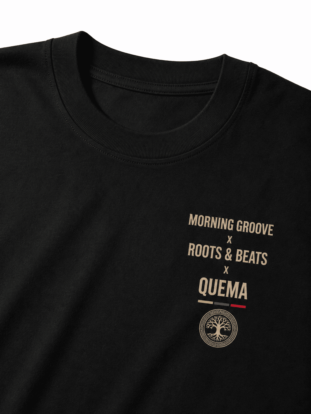 Black tee with tan Morning Groove x Roots & Beats x QUEMA chest print and tree-of-life seal